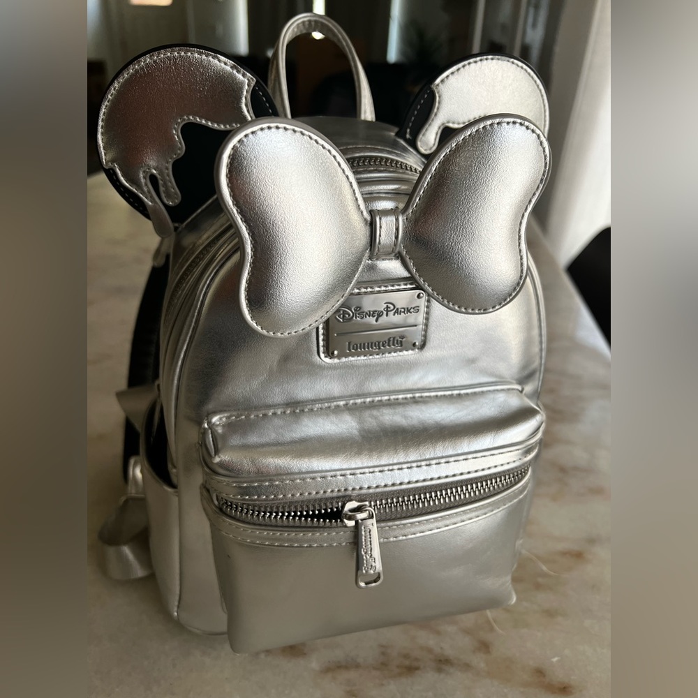 Authentic Platinum drip 100 celebration Loungefly backpack.
